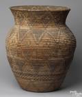 Large Apache coiled pictorial storage jar of classical form