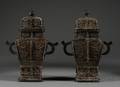 Pair of Bronze Covered Jars
