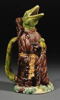 Anthropomorphic Majolica Pitcher Modeled as a Lizard in Monks Robes