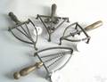 English flat iron shaped wrought iron trivet