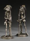 Pair of Silvered Metal Figural Candlesticks
