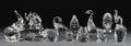 Twelve Assorted Colorless Glass Figures