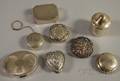 Eight Small Sterling Silver Pill and Lidded Boxes