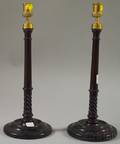 Pair of Carved Mahogany Columnar Candlesticks with Brass Candle Sockets