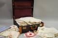 Small Group of Assorted Linens in a Vintage Suitcase