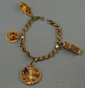 14kt Gold Charm Bracelet with Four 14kt and 10kt Gold Charms