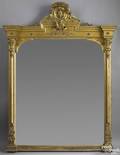 Massive Empire carved and giltwood over mantle mirror ca 1840