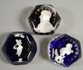 Three Baccarat Faceted Sulphide Art Glass Paperweights