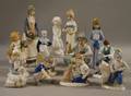 Twelve Assorted Collectible Ceramic Figures