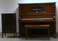 WW Kimball Co Walnut Upright Player Piano with Cabinet of Eighty Rolls