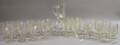 Thirtyone Colorless Pressed Pattern Glass Goblets and a Pitcher