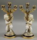 Pair of European Gilt and Cobaltdecorated Porcelain Putti Figural Candelabra