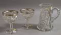 Three Decorative Colorless Cut Glass Table Items