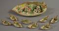 Ninepiece Gilt and Handpainted Limoges Porcelain Leafform Nut Set