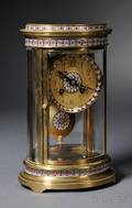 Tiffany  Co Oval Brass and Cloisonne Crystal Regulator