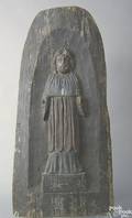 European carved plaque of a saint