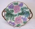 Etruscan majolica serving dish with floral and leaf decoration