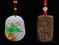Two Wood or Jade Pendants