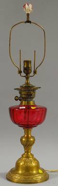 Late Victorian Brass Oil Table Lamp with Cranberry Art Glass Font
