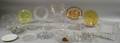 Twentytwo Mostly Colorless Pressed Pattern Glass Portrait Plates Platters and Trays