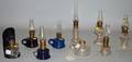 Nine Small Pressed Glass Oil Lamps
