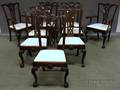 Assembled Set of Nine Chippendalestyle Carved Mahogany Dining Chairs
