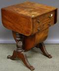 Empire Carved Mahogany and Mahogany Veneer Dropleaf Twodrawer Sewing Stand