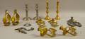 Seven Pieces of Brass and Pewter Lighting and a Pair of Brass Stirrups