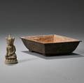 Iron Planter and Seated Deity