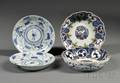 Four Blue and White Plates