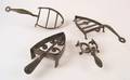 Wrought iron trivet of flat iron form