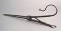 Pair of American wrought iron spring action pipe tongs late 18th c