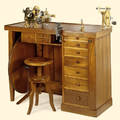 Very rare and fine wooden watchmakers bench equipped with face plate engine