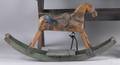 Carved and painted childs rocking horse