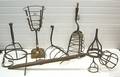 Eight wrought iron torch cressets 18th c