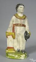 Chalkware figure of a boy 19th c