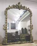 Large carved and gilded mirror