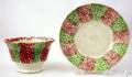 Red and green rainbow spatter cup and saucer