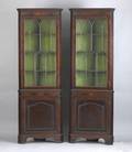 Pair of Regency mahogany corner cupboards ca 1795