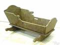 Swirl decorated doll cradle