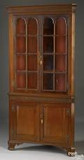 Pennsylvania Federal cherry 2piece corner cupboard ca 1800
