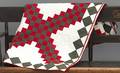 Vibrant red green and white pieced quilt 19th c
