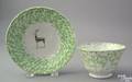 Green spatter cup and saucer