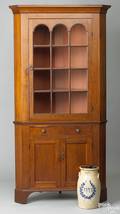 Pennsylvania Federal cherry 2piece corner cupboard ca 1810