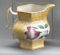 Yellow spatter paneled pitcher