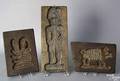 Four carved wooden cake molds