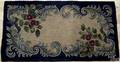 Three American hooked rugs with floral decoration