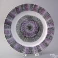 Vibrant black and purple rainbow spatter plate