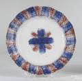Red and blue rainbow spatter crisscross paneled plate