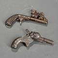 Two Cast Iron Toy Cap Guns